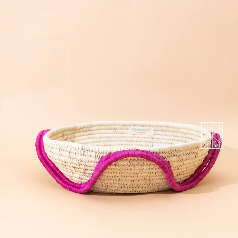 Palm leaf multipurpose storage basket with pink colored design